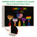 Natural wood framed LGBT wall art displaying diverse pride hearts and colorful lettering