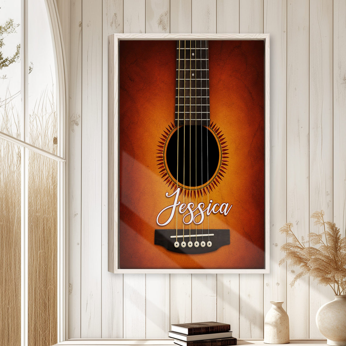 Framed guitar wall art displayed in a bright wood-paneled room with rustic home decor