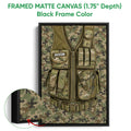 Black framed canvas wall art displaying a camouflage tactical vest with close-up fabric detail