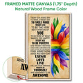 Framed LGBT canvas wall art shown with a natural wood frame and colorful uplifting artwork