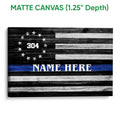Matte canvas police wall art featuring a black and white flag design with a blue line