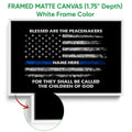White framed police wall art featuring a black distressed flag, white stars, and a blue line accent