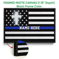 Black framed canvas police wall art featuring a thin blue line flag design and a close-up of the frame edge