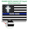 White framed canvas police wall art featuring a thin blue line flag design and a close-up of the frame edge