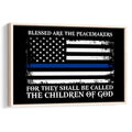 Framed wall art featuring a distressed black, white and blue-line flag with a peace-themed message