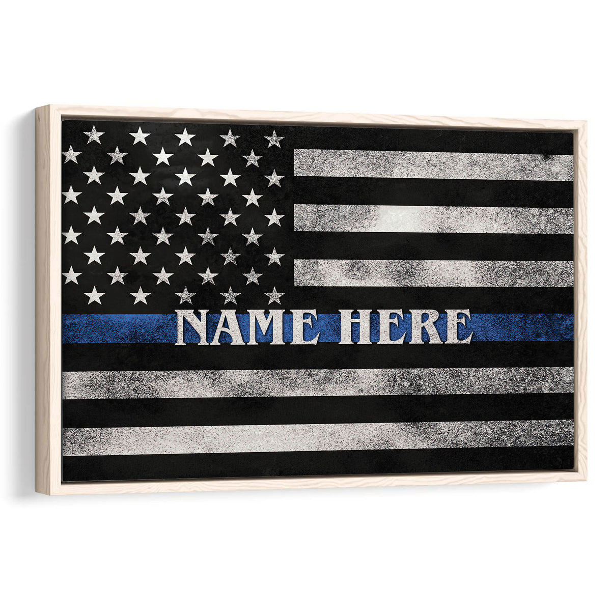 Framed police wall art featuring a distressed black and white flag with a blue line