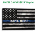 Matte canvas wall art showing a distressed police flag in black, white and blue