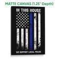 Matte canvas police wall art featuring a distressed black, white, and blue-line flag design