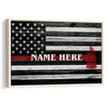 Framed firefighter wall art with a black, white, and red American flag design and fire helmet motif