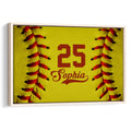 Framed softball wall art with bright yellow ball texture and red stitching details