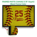 Black framed canvas softball wall art with a close-up view of the frame and artwork texture