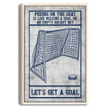 Framed hockey wall art with a navy goal illustration, puck, and motivational sports message