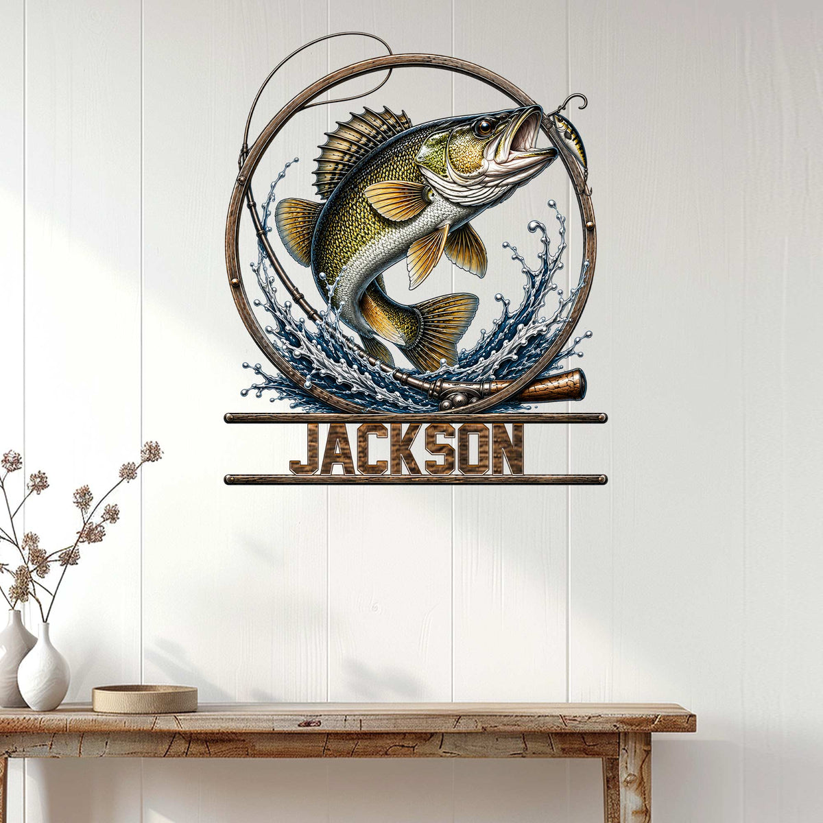 Fishing wall decor displayed on a light wood wall, featuring a bass leaping through waves and fishing gear