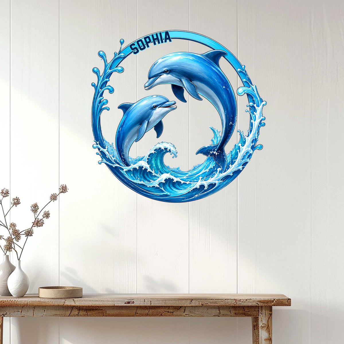 Dolphin metal wall decor displayed on a light wood-paneled wall above a console table