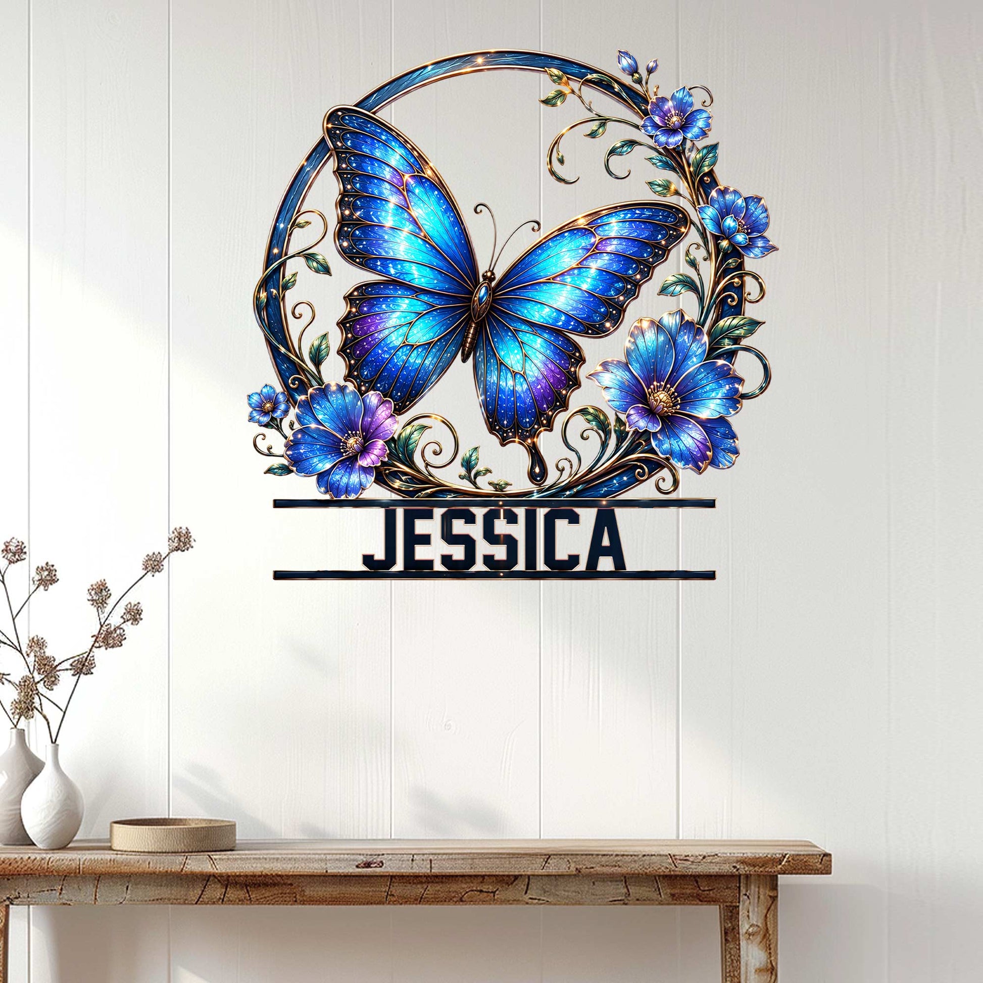 Blue butterfly wall sign displayed on a light paneled wall above a wood console table