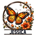 Ornate orange butterfly metal sign surrounded by curling vines and bright floral accents