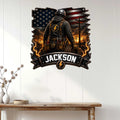 Lineman metal wall sign displayed on white wood paneling above a console table in a home