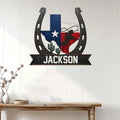 Texas cowboy wall sign displayed on white paneled decor with a bold horseshoe and western artwork