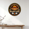 Pizza wall sign displayed above a console table, featuring fiery oven artwork and crossed pizza peels
