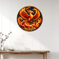 Round phoenix wall sign displayed on a bright paneled wall above a wooden console table