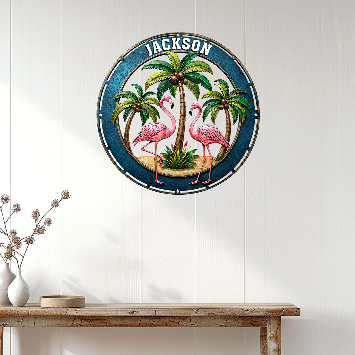 Flamingo wall sign displayed on a white paneled wall above a console table in a bright home interior