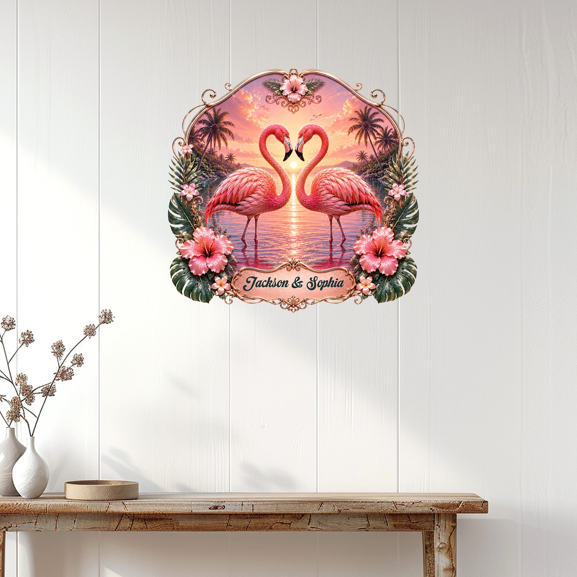 Tropical flamingo wall decor displayed on a white paneled wall above a console table
