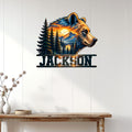 Bear wall sign displayed on a light wood-paneled wall above a rustic console table