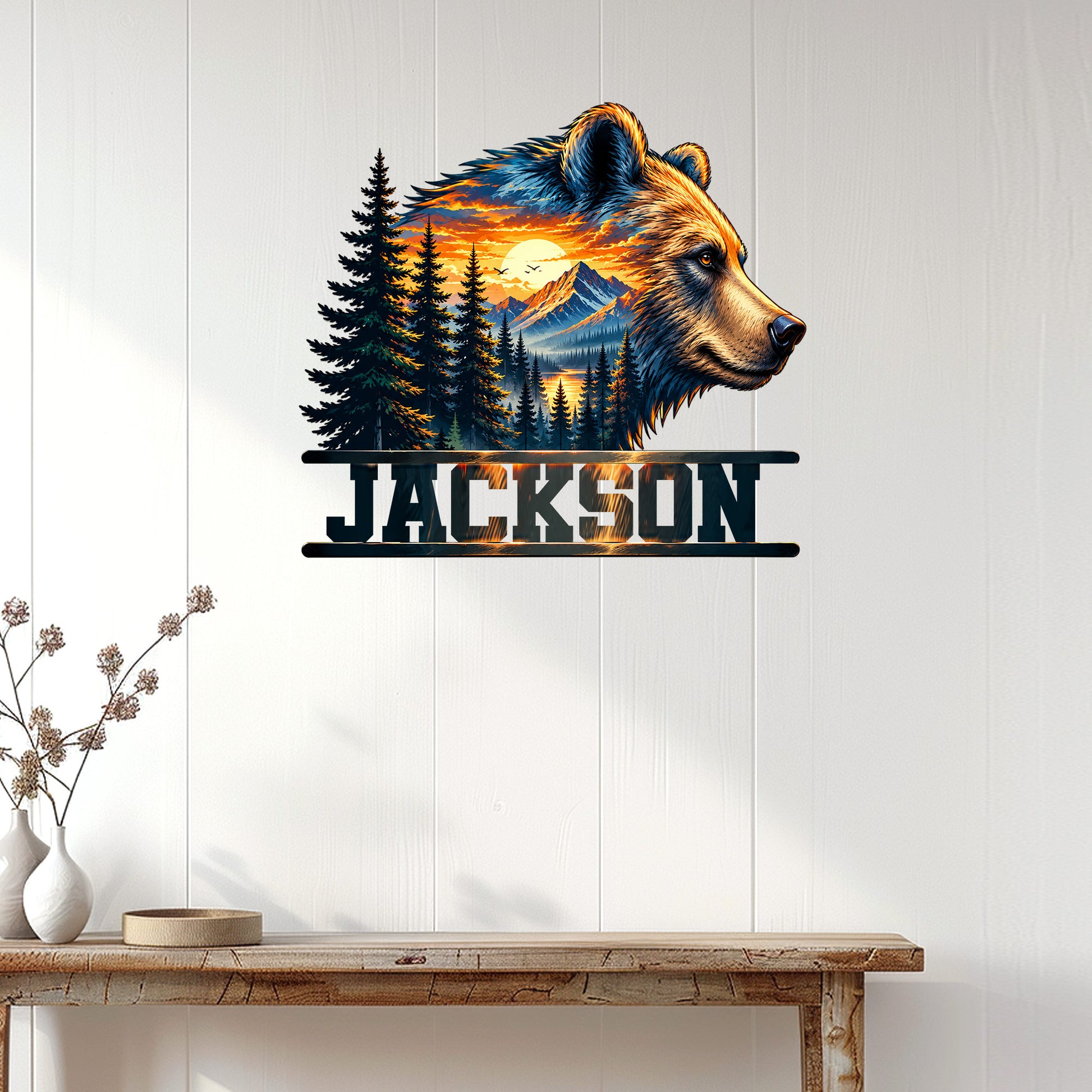 Bear wall sign displayed on a light wood-paneled wall above a rustic console table