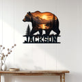 Bear wall decor displayed on a light wood-paneled wall above a rustic console table