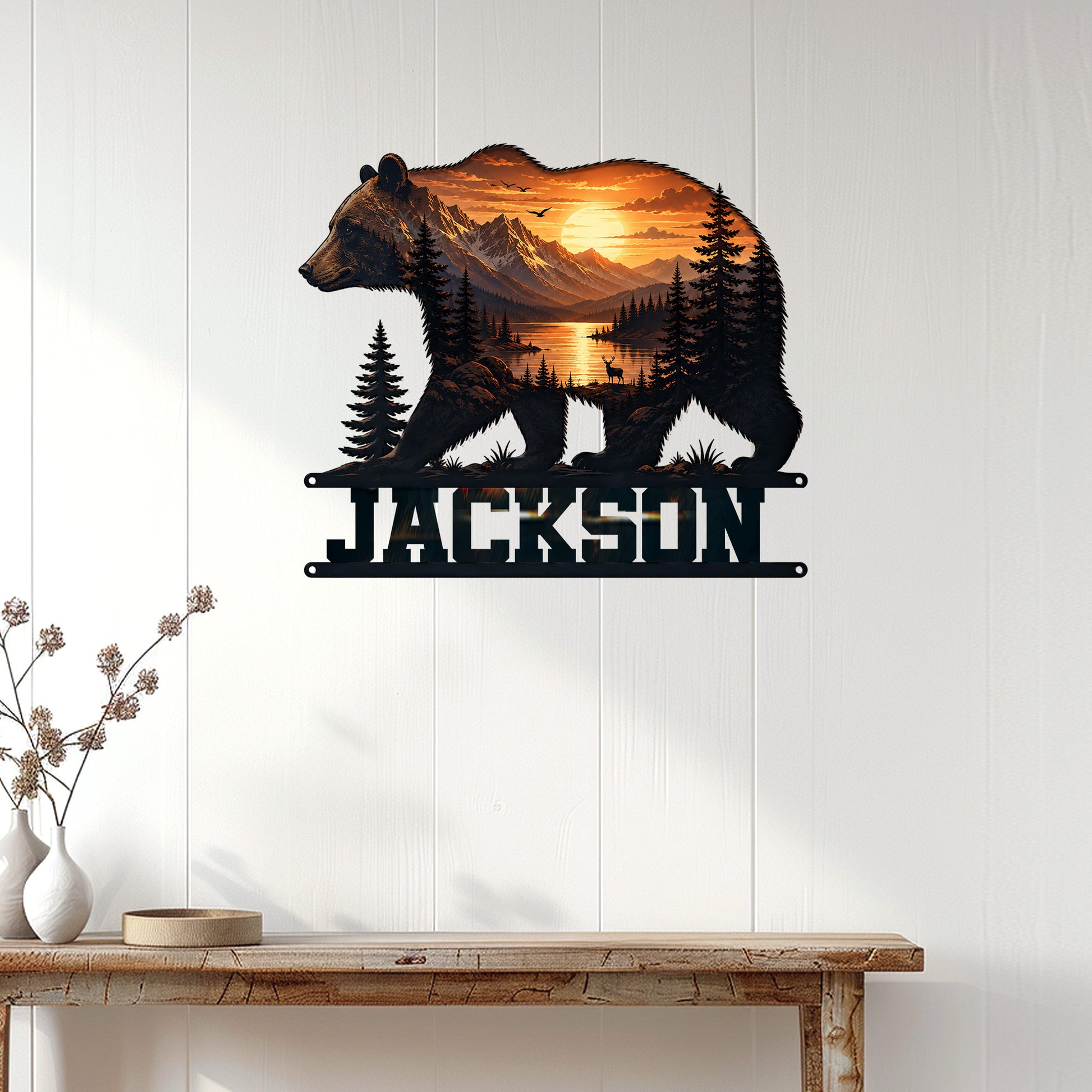 Bear wall decor displayed on a light wood-paneled wall above a rustic console table