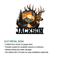Detailed deer wall sign shown with a mountain landscape, forest lake, and cut metal sign design