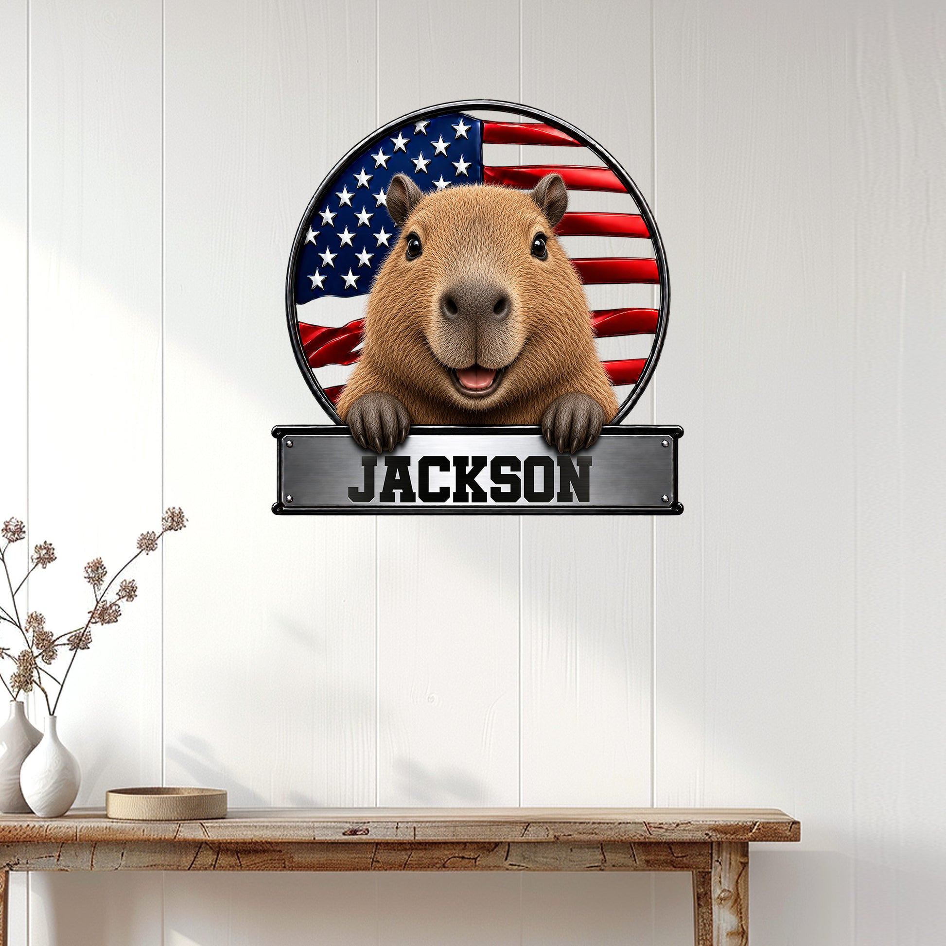 Patriotic capybara metal sign displayed on a bright paneled wall above a wood console