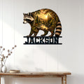Raccoon metal wall sign displayed on a white paneled wall above a rustic console table