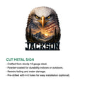 Cut metal eagle sign featuring a patriotic eagle, flag, mountain scenery, and bold lower lettering