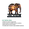 African elephant cut metal sign showcasing a colorful savanna landscape and bold lower name design