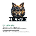 Cut metal wolf sign showcasing a detailed mountain forest scene and bold lower display design