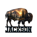 Bison metal sign featuring a mountain landscape, evergreen forest, sunset, and bold custom design