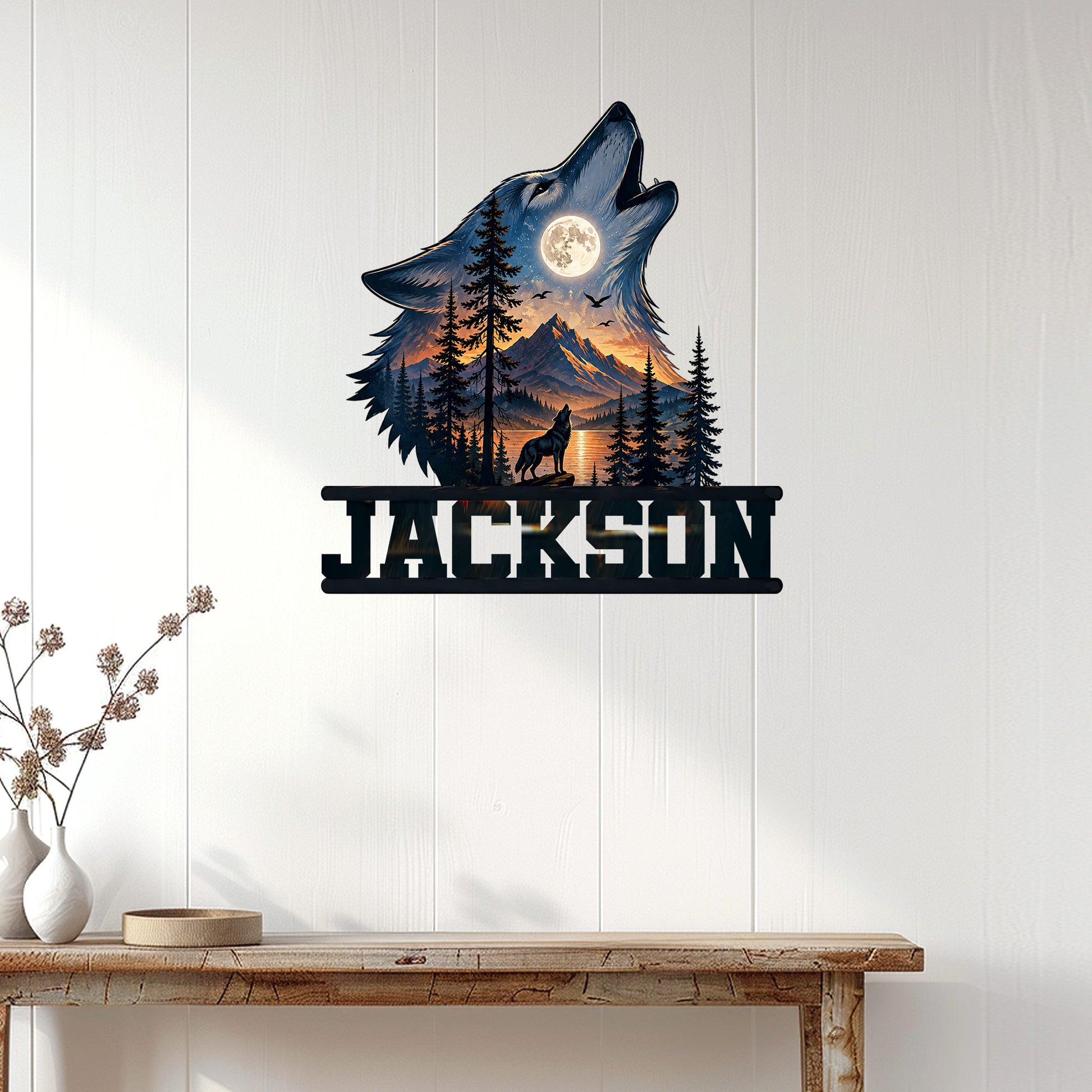 Custom wolf metal sign displayed on a white wood-paneled wall above a rustic console table