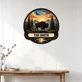 Custom bison wall sign displayed on a white paneled wall above a rustic console table