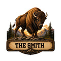 Custom bison metal sign featuring a powerful buffalo above a mountain and pine tree landscape