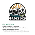 Triathlon cut metal sign showing the swim, bike, and run stages with a bold athletic silhouette