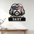 Patriotic Lhasa Apso metal wall sign displayed on a white paneled wall above a console table