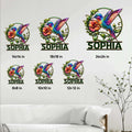 Hummingbird metal sign size guide showing six available square dimensions in a room setting