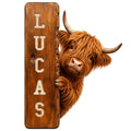 Custom Highland cow metal sign featuring a shaggy horned cow peeking around a rustic wood-look plank