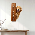 Golden Retriever metal sign displayed on a white paneled wall above a console table
