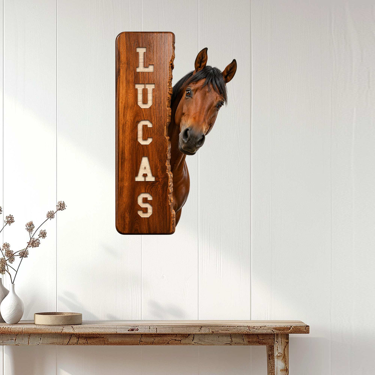 Rustic horse wall sign displayed on a bright white paneled wall above a console table