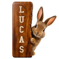 Custom rabbit metal sign featuring a realistic bunny peeking around a rustic wood-look sign