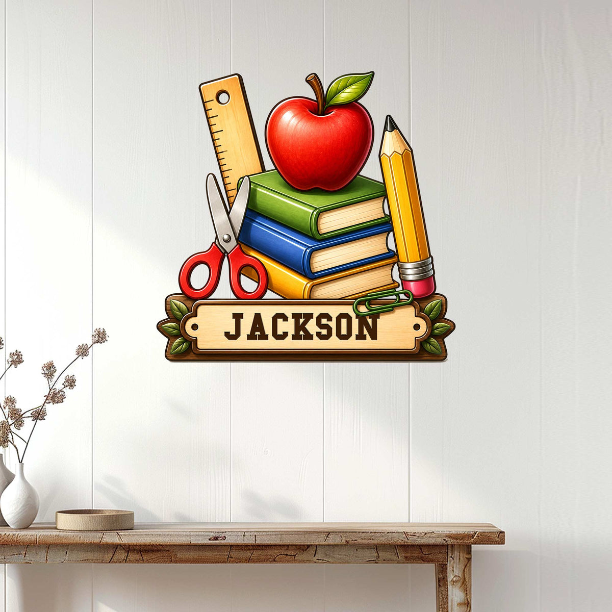 Teacher classroom wall decor displayed on a light paneled wall above a console table