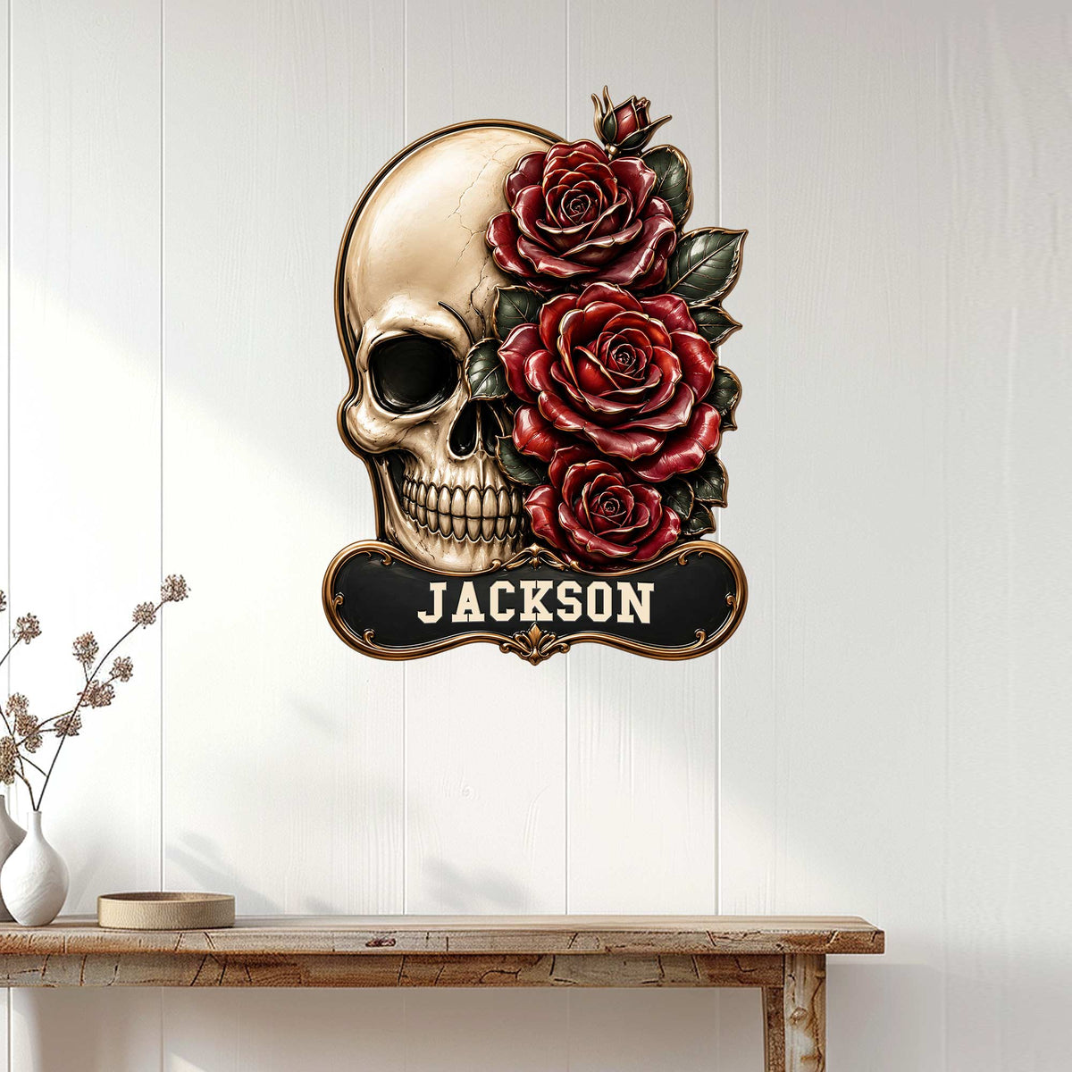 Gothic skull and rose metal wall sign displayed on a white paneled wall above a console table