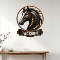 Black horse wall sign displayed on white paneled wall above a console table